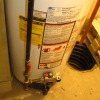 Is my Gas Hot Water Heaters Anodes causing my Black and Rusty water? Can I fix it myself? How hard will it be?
