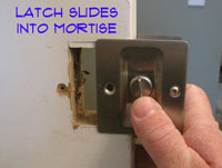 Sliding a Pocket Door Lock Into the Mortise