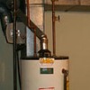 How do I vent a gas hot water heater? Can I do it myself?